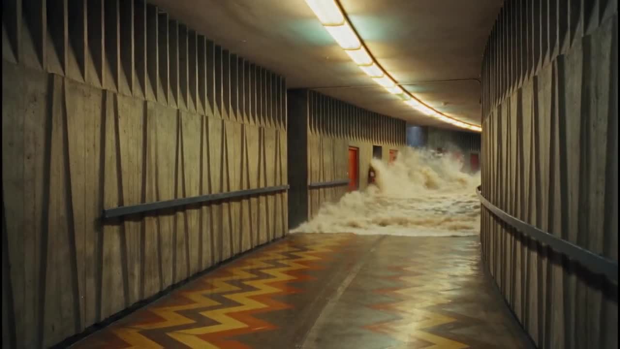 A flood surging through a corridor in Rock My Soul